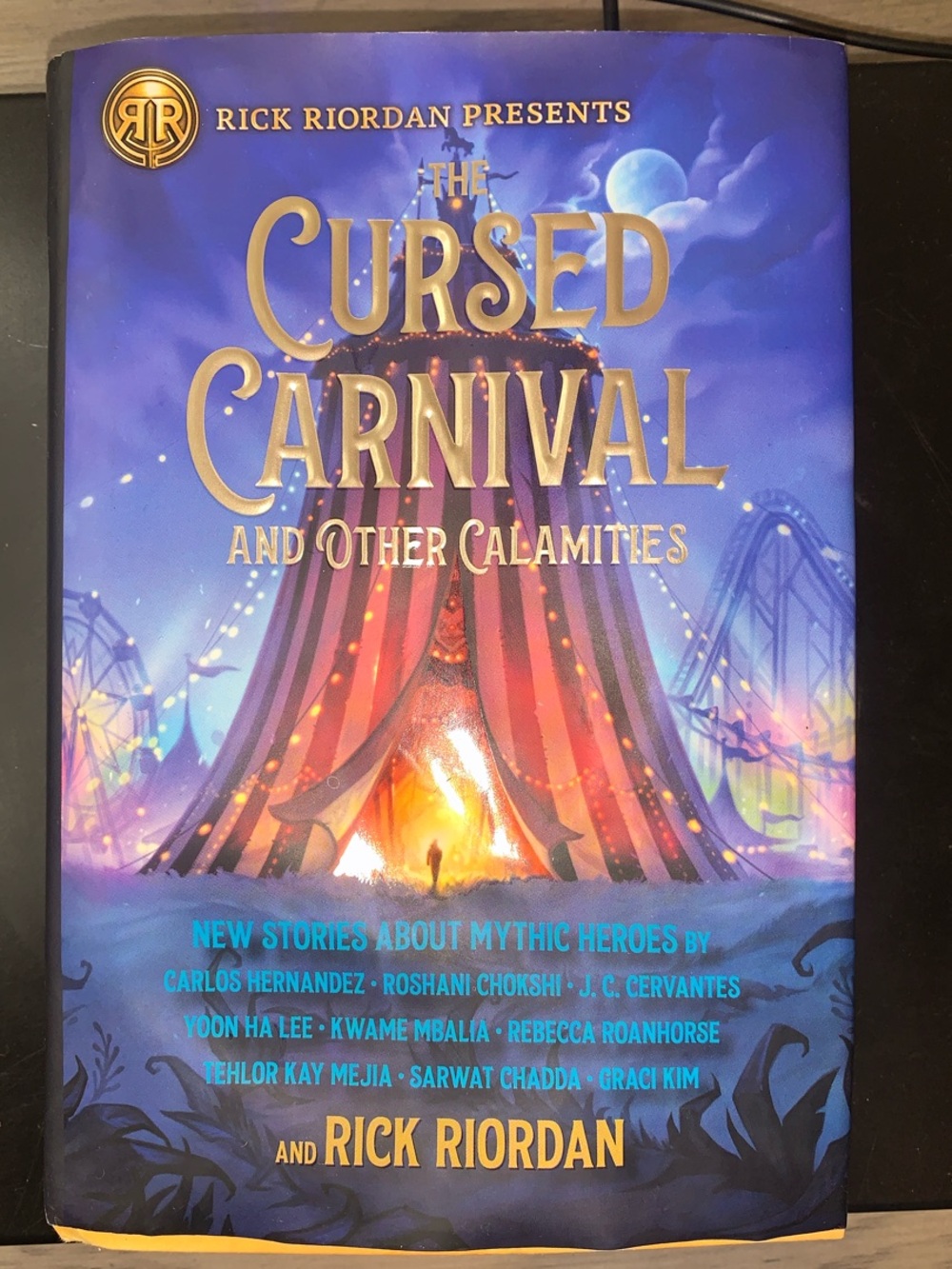 The Cursed Carnival and Other Calamities by Rick Riordan – Blue Hardcover Book